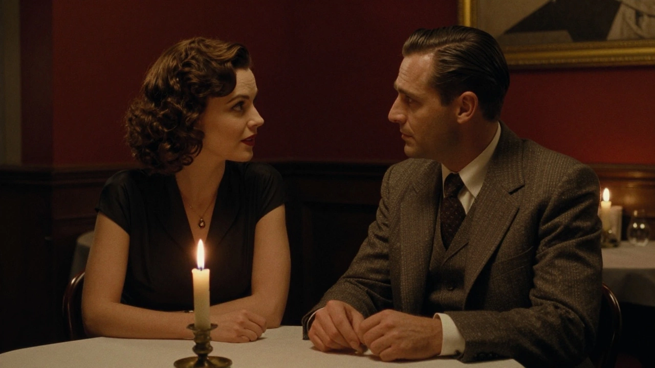 A man and woman in a dim Paris bistro sharing silent, meaningful eye contact over a candlelit table.